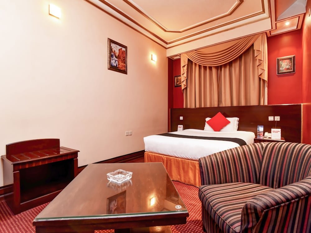 Фото Capital O456 Almansour Grand Hotel