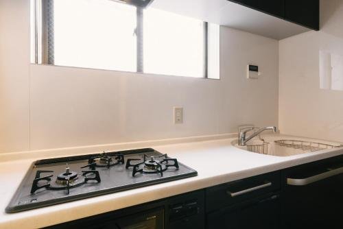 Фото Guest House Yasuragi Hakata Station Side