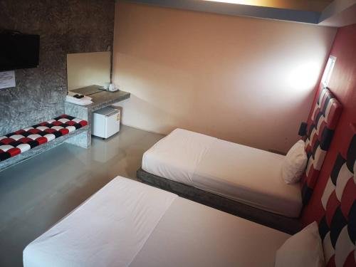 Фото Suwannaphum Trang Resort