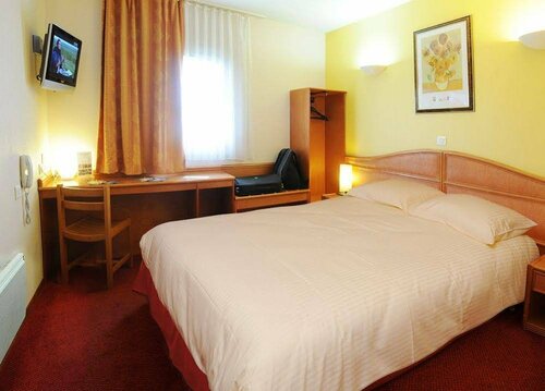 Гостиница Hôtel Roi Soleil Mulhouse Sausheim в Тане-Гебвиллере