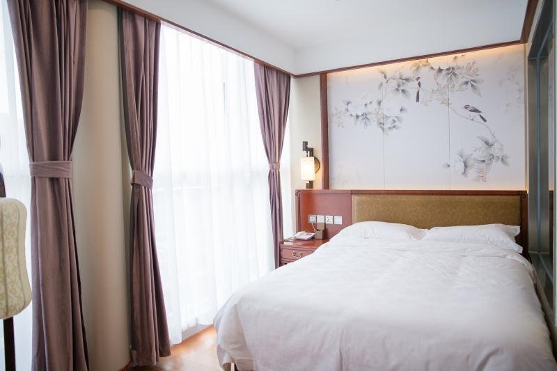 Фото Yitingzhenshe Hotel