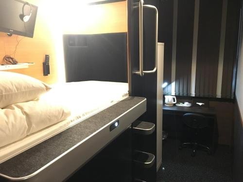 Фото Sejour Inn Capsule