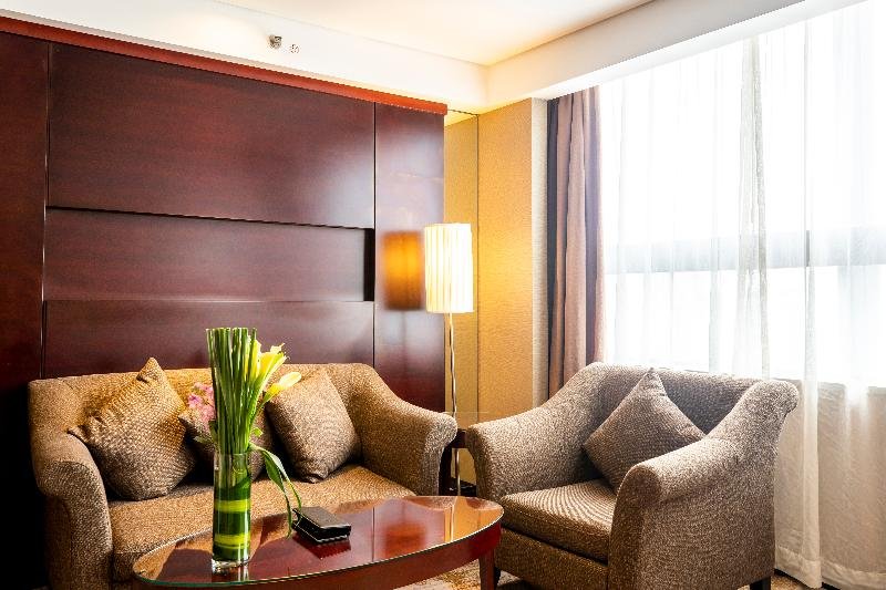 Фото Shanghai Greenland Jiulong Hotel