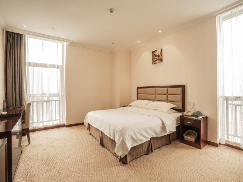 Фото GreenTree Inn Shaoxing Keqiao Xingyue Road Zhongqing Building Hotel