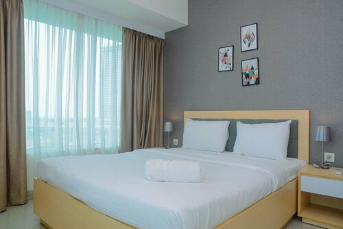 Гостиница Cozy And Great Choice Studio At Grand Kamala Lagoon Apartment в Бекаси