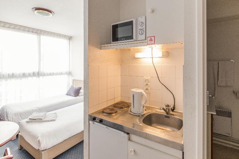 Фото Zenitude Hôtel-Résidences Le Mans Novaxis