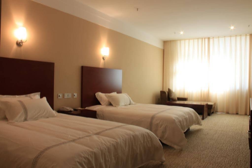 Фото Luoyang Yilu Gangwan Hotel