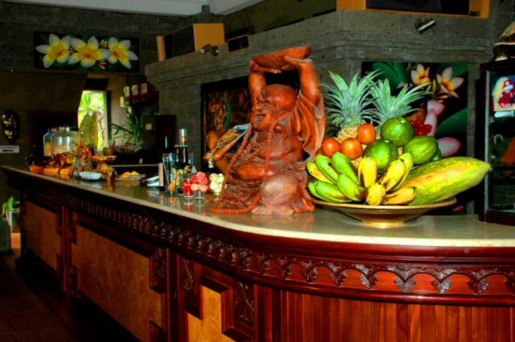 Фото Puri Rai Hotel