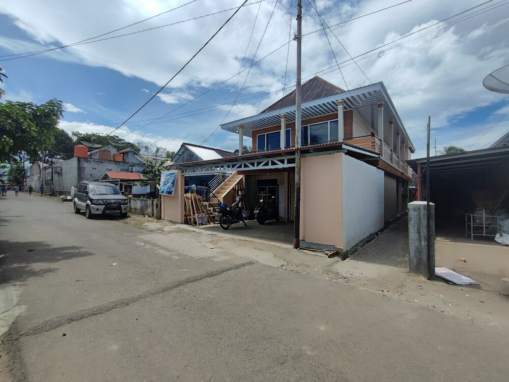 Фото Oyo 92357 Zzip Homestay