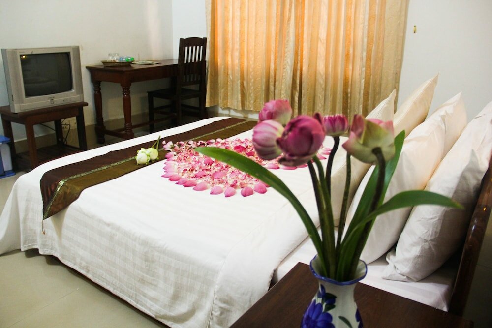 Фото Tropical Breeze Guesthouse