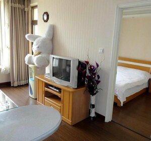 Апартаменты Dalian Xiu Zhu Mansion Apartment