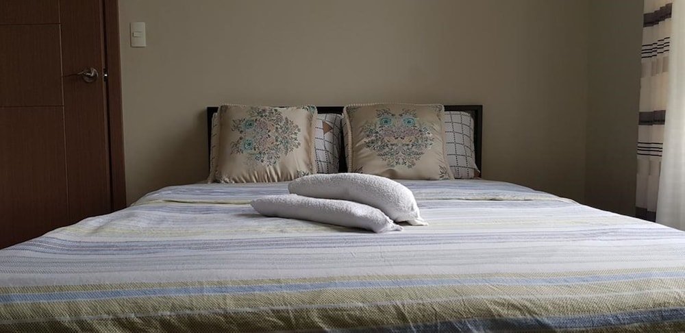 Фото Tess and Tessha Condotel near T3 Airport