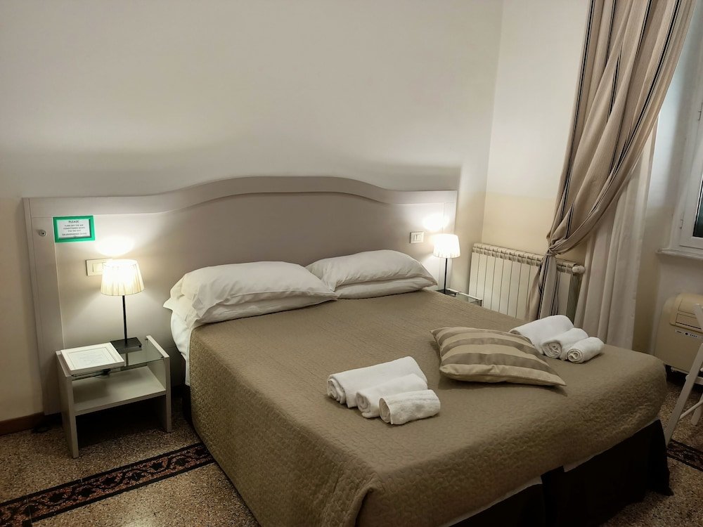 Фото Biancoreroma B&b