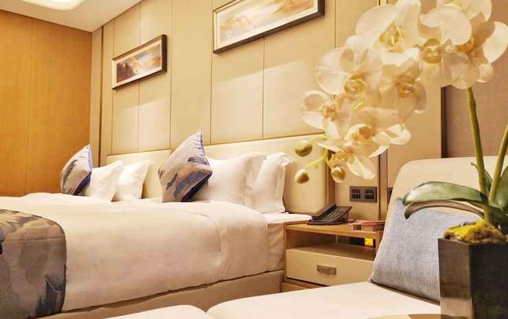 Фото Ramada Plaza Dongxing City Center