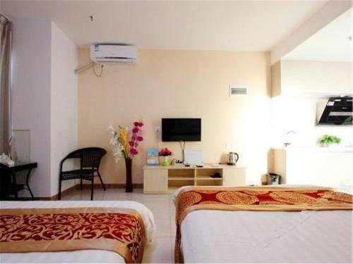 Фото Weihai You Gang Vacation ApartHotel