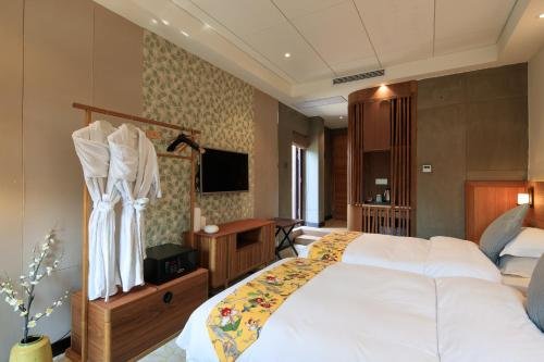 Фото Hangzhou Serene Cicada Hotel Hupao Branch