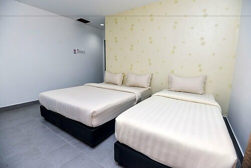 Гостиница Alpha Hotel в Кота-Кинабалу
