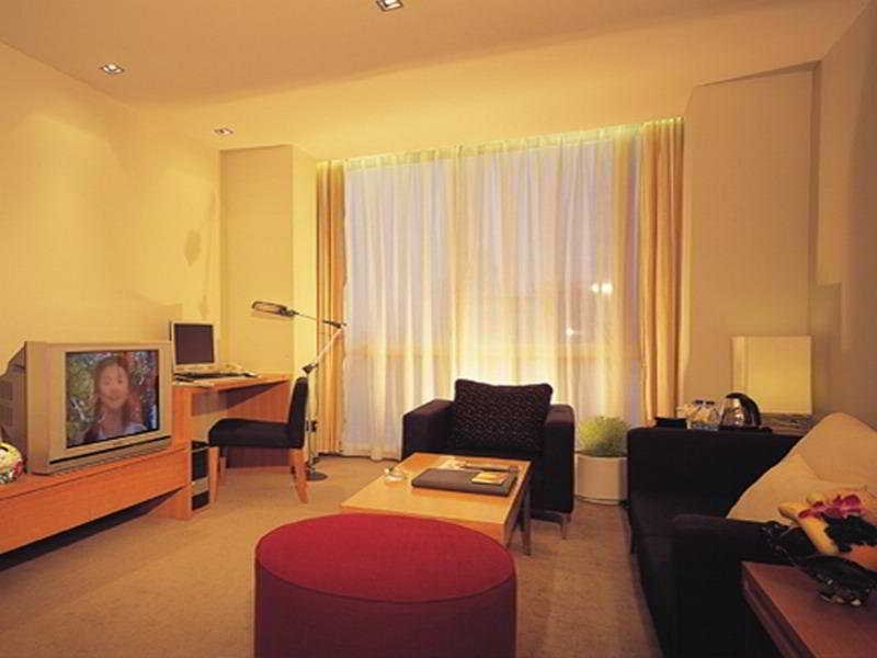 Фото Hotel Kapok Wuxi