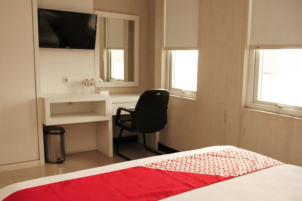 Фото Oyo 283 Helvetia Residence