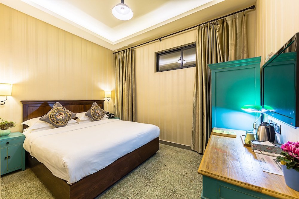 Фото Wuyang Boutique Hotel - Hefang Street