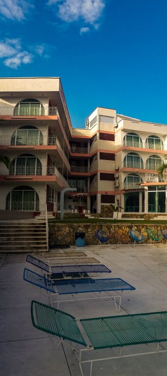 Фото Capital O Hotel El Mejicano