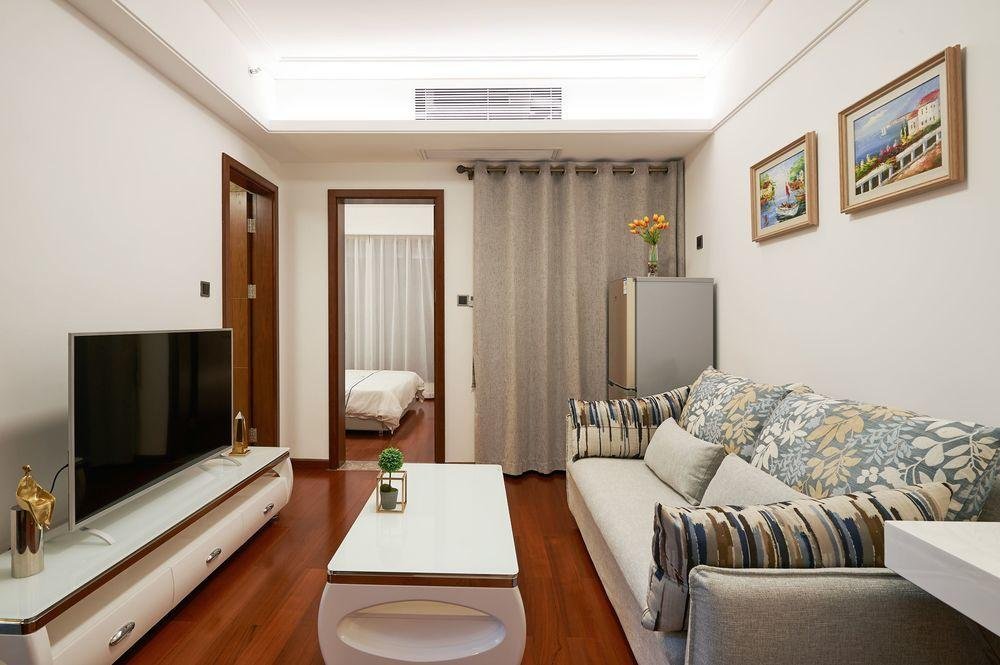 Фото Shen Gang Executive Apartment-Long Hua