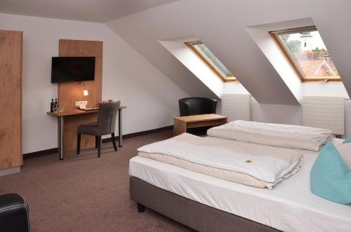 Фото Hotel Am Hachinger Bach