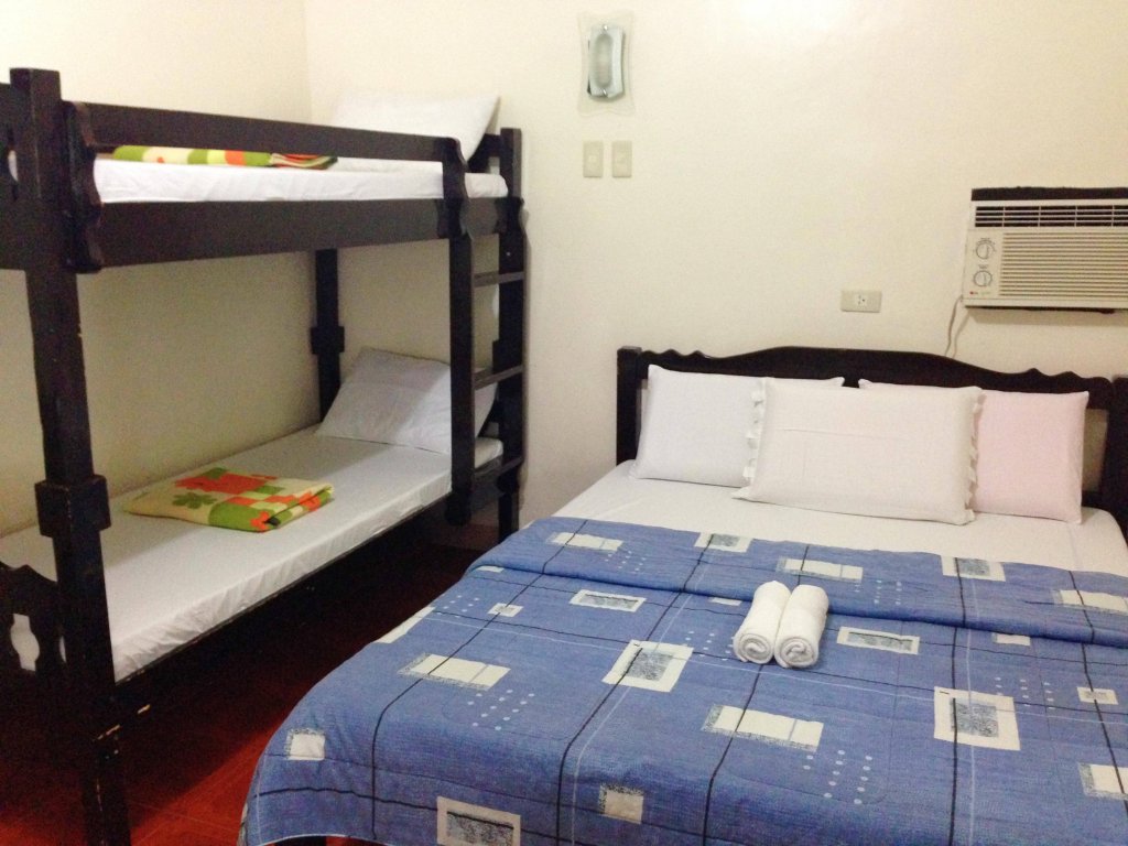 Фото Sierra Traveller’s Inn Holy Spirit