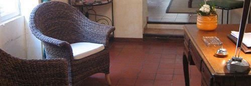 Фото Au Saint Roch - Hôtel et Jardin