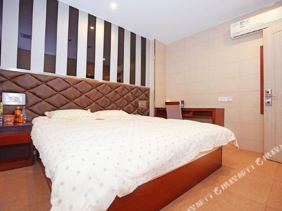 Фото Hesheng Business Hotel