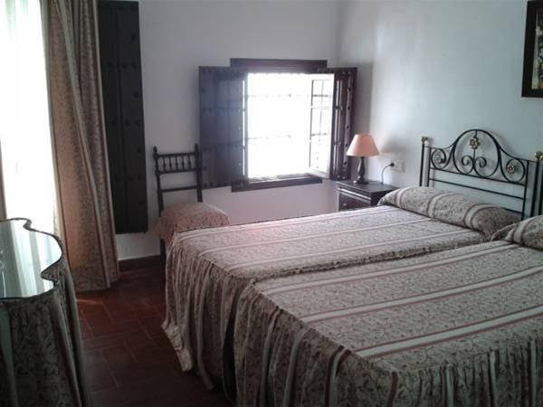 Фото Hostal Gran Capitan