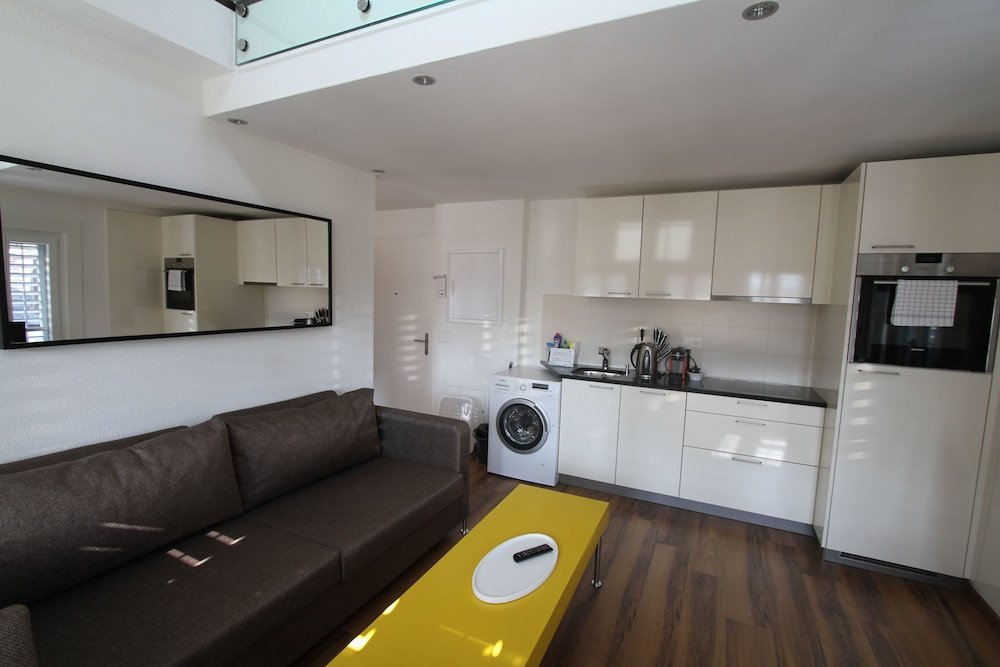 Фото Luxury Apartments by Livingdowntown