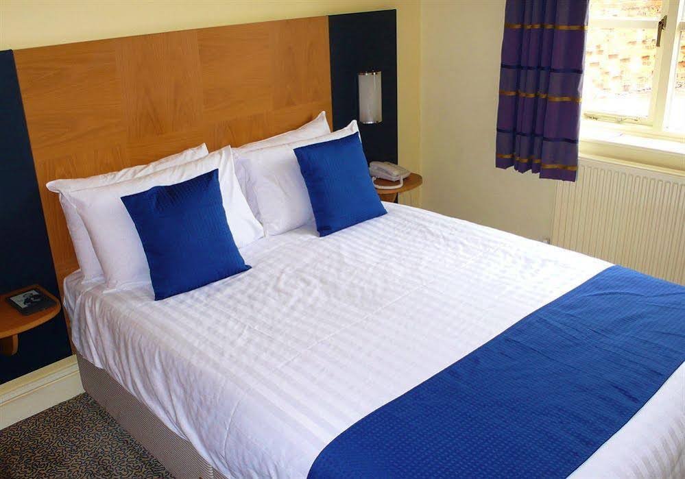 Фото Corner House Hotel