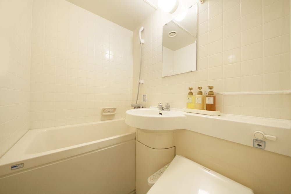 Фото Sendai Business Hotel