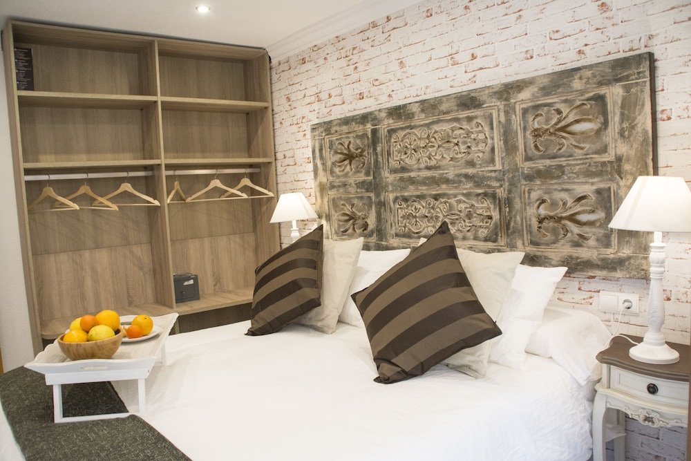 Фото Apartamentos Sevilla Palace