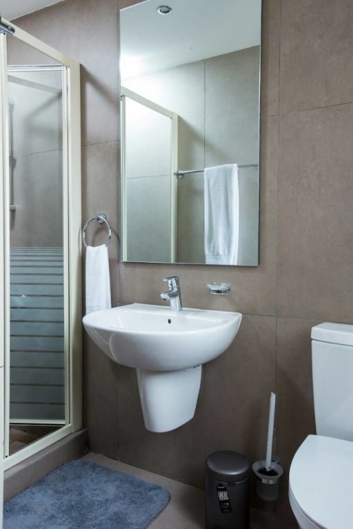 Фото The Urban Apartments & Suites