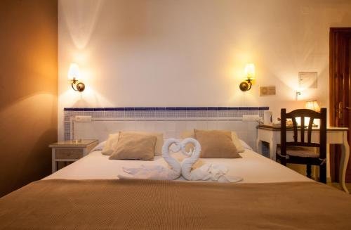 Фото Hostal Boutique Plaza Cantarero