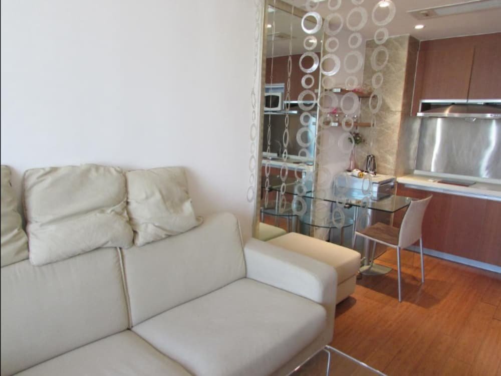 Фото Guangzhou Damei Apartment