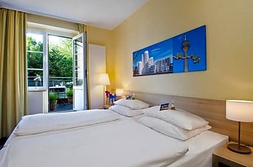 Фото Hotel Am Hofgarten