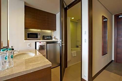 Фото Axia South Cikarang Service Apartment