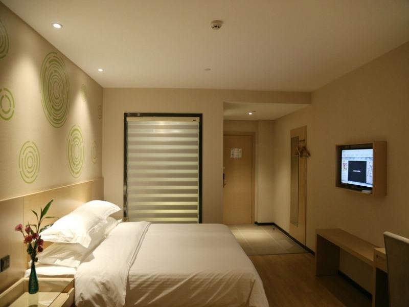 Фото GreenTree Inn Taizhou East Meilan Road University Town Hotel
