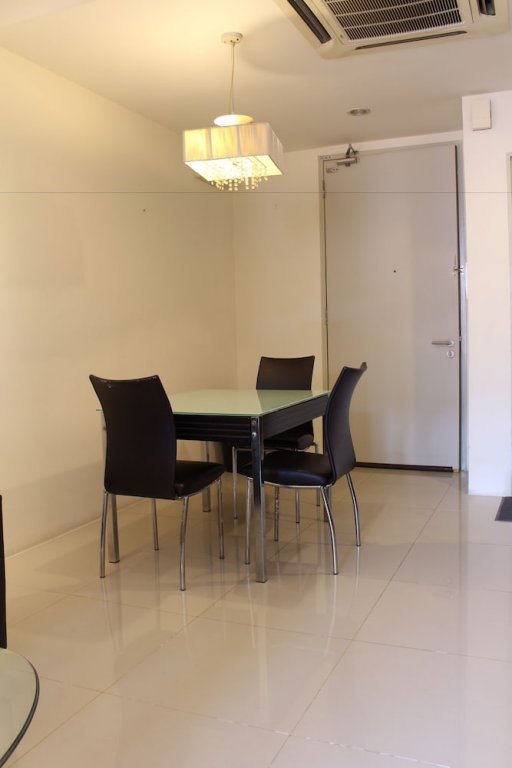 Фото Peaceful Service Suites at Taragon Puteri Bintang