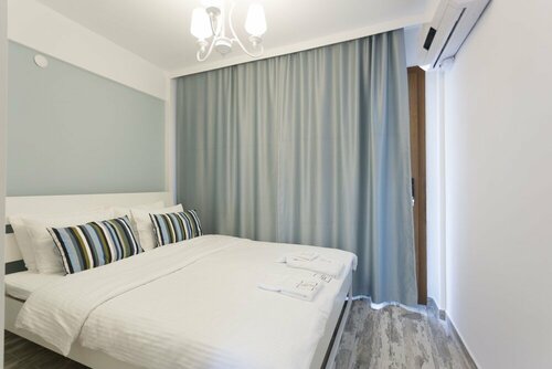 Апартаменты Alp Suites Limon в Ула