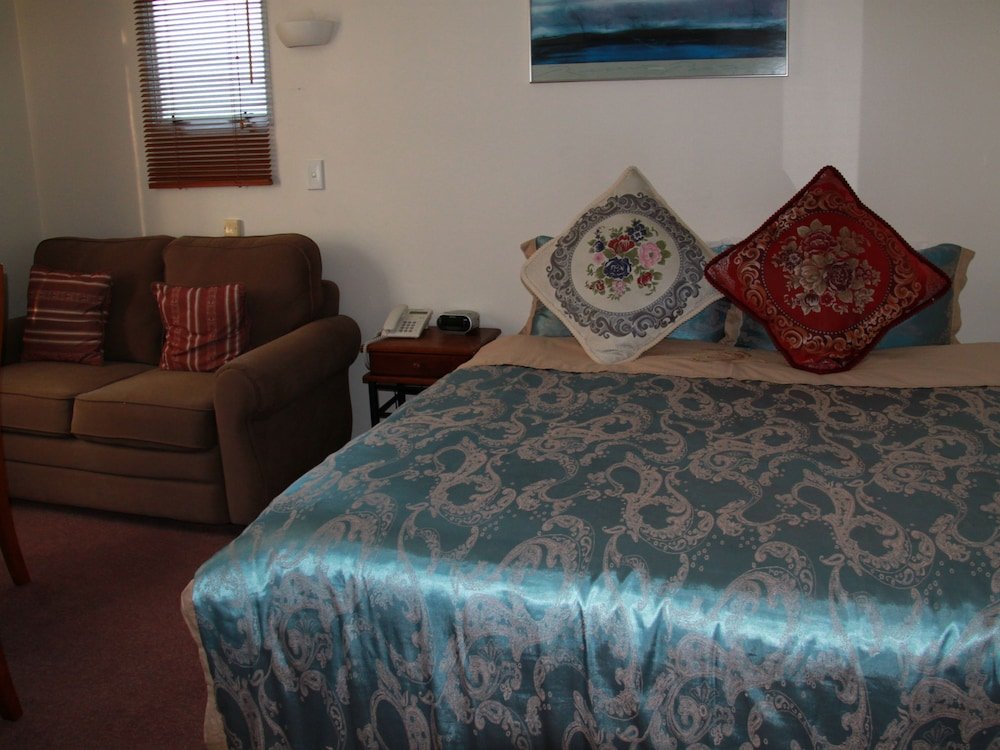 Фото Asure Camelot Arms Motor Lodge