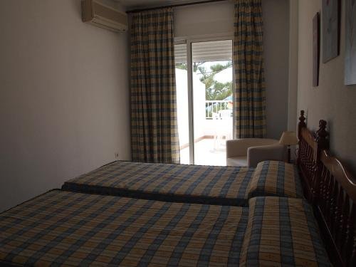 Фото Hostal Tres Soles