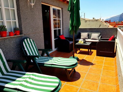 Жильё посуточно Apartment with 2 bedrooms in Puerto de Santiago with wonderful mountain view furnished terrace and WiFi 900 m from the beach