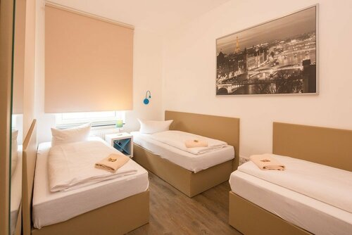 Гостиница T3 Cityloft Appartments в Коршенбройхе