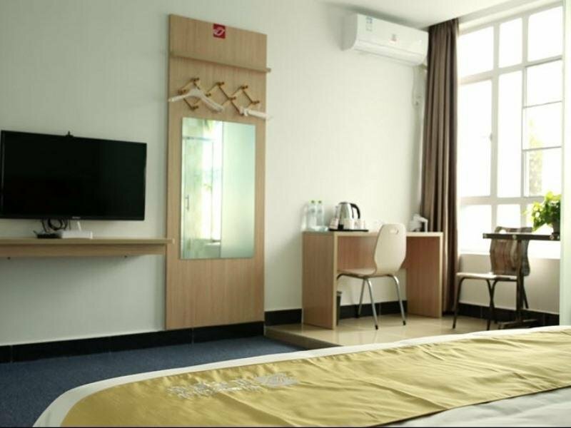 Гостиница GreenTree Inn Haikou Hainan University Shell Hotel в Хайкоу