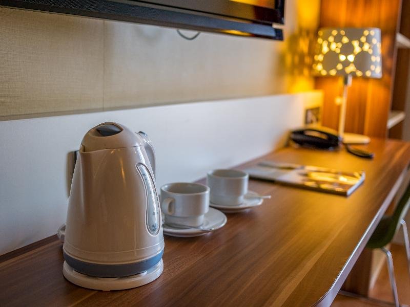 Фото Golden Avenida Family Suites