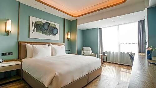 Фото Shaoxing Xianheng Grand Hotel